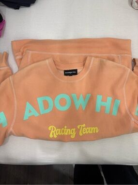 Shadow Hill Peach Crewneck Sweatshirt with Aqua and Yellow Graphics